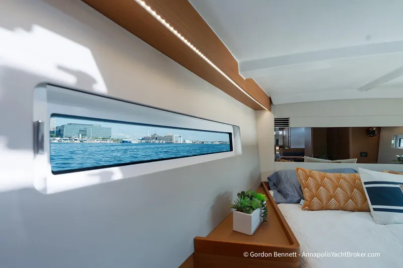 Boat Tox Yacht Photos Pics Interior of 2022 Jeanneau Sun Odyssey 440 yacht with scenic window view.