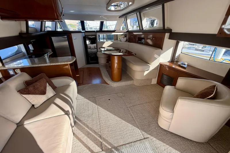  Yacht Photos Pics Luxurious interior of 2009 Carver 43 Super Sport yacht with elegant seating and modern design.