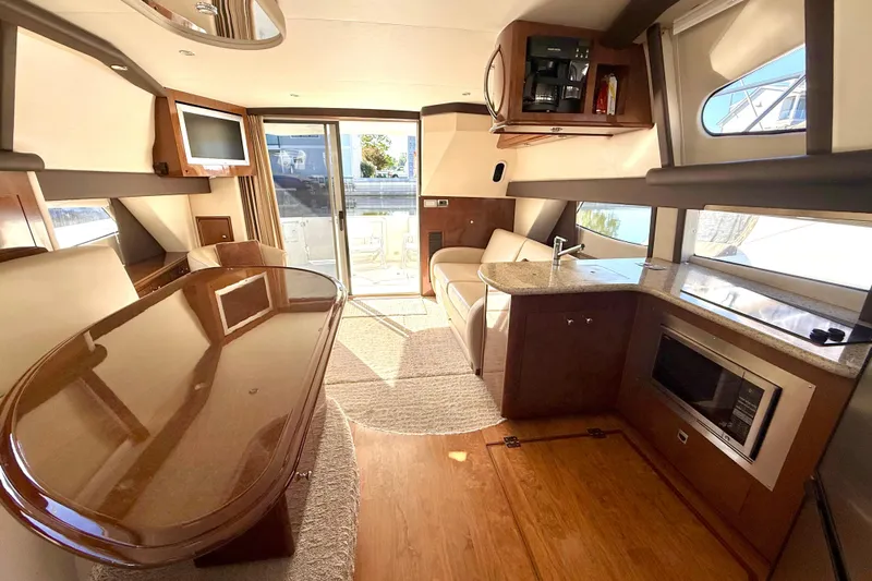  Yacht Photos Pics Luxurious interior of 2009 Carver 43 Super Sport yacht with modern amenities.