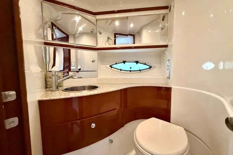  Yacht Photos Pics Luxurious bathroom in 2009 Carver 43 Super Sport yacht with modern fixtures and elegant design.