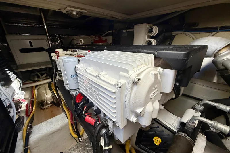  Yacht Photos Pics Engine room of a 2009 Carver 43 Super Sport yacht, featuring Volvo Penta components.