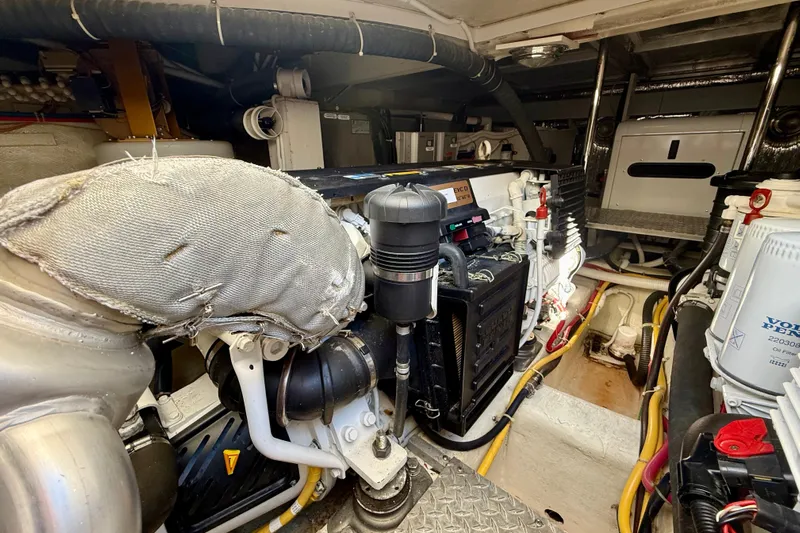  Yacht Photos Pics Engine room of 2009 Carver 43 Super Sport yacht, showcasing mechanical components.