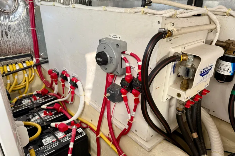  Yacht Photos Pics Engine room of 2009 Carver 43 Super Sport with batteries and wiring.