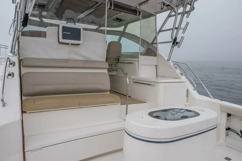 Teddy's Float Too Yacht Photos Pics 2015 Tiara Yachts 4300 Open cockpit with seating and ocean view.