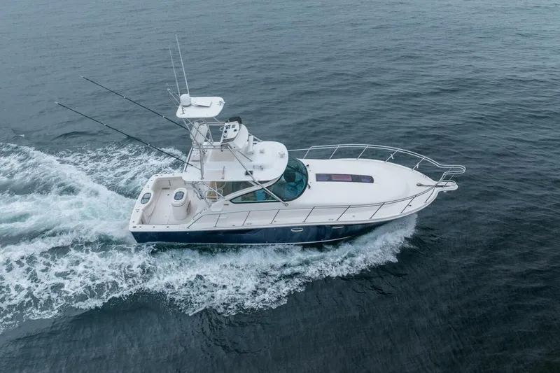 Teddy's Float Too Yacht Photos Pics 2015 Tiara Yachts 4300 Open cruising on open water, aerial view.