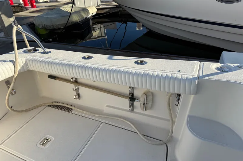 Teddy's Float Too Yacht Photos Pics 2015 Tiara Yachts 4300 Open boat deck with storage and cleaning tools.