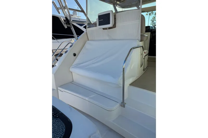 Teddy's Float Too Yacht Photos Pics Tiara Yachts 4300 Open 2015 model, featuring sleek white seating and stainless steel railings.