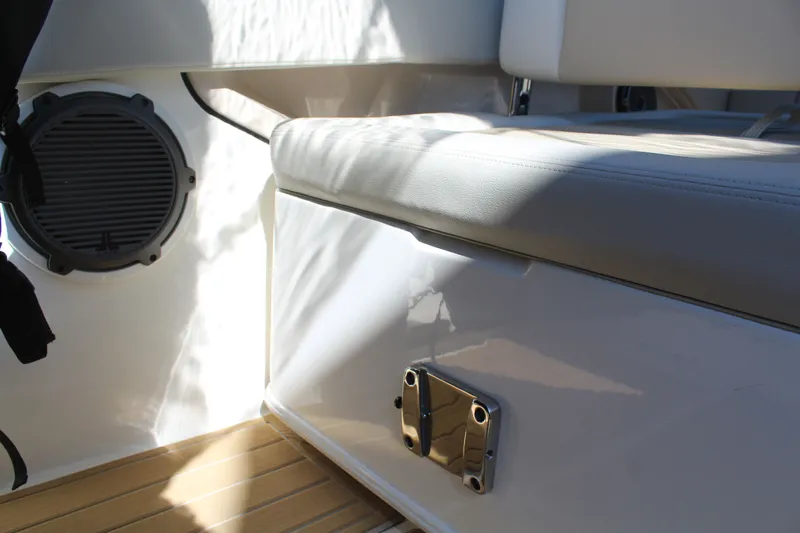 Going To The Sun Yacht Photos Pics Interior of 2023 Boston Whaler 240 Vantage with seat and speaker.