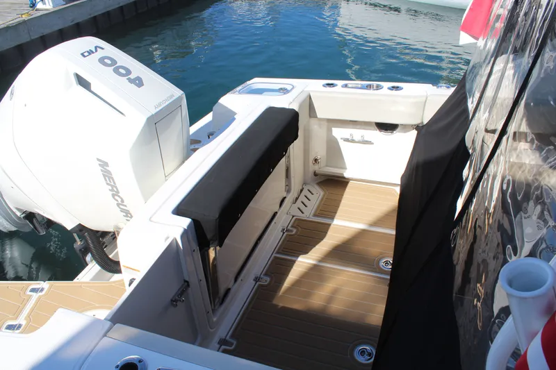 Going To The Sun Yacht Photos Pics Boston Whaler 240 Vantage 2023 with Mercury 400 engine at dock.
