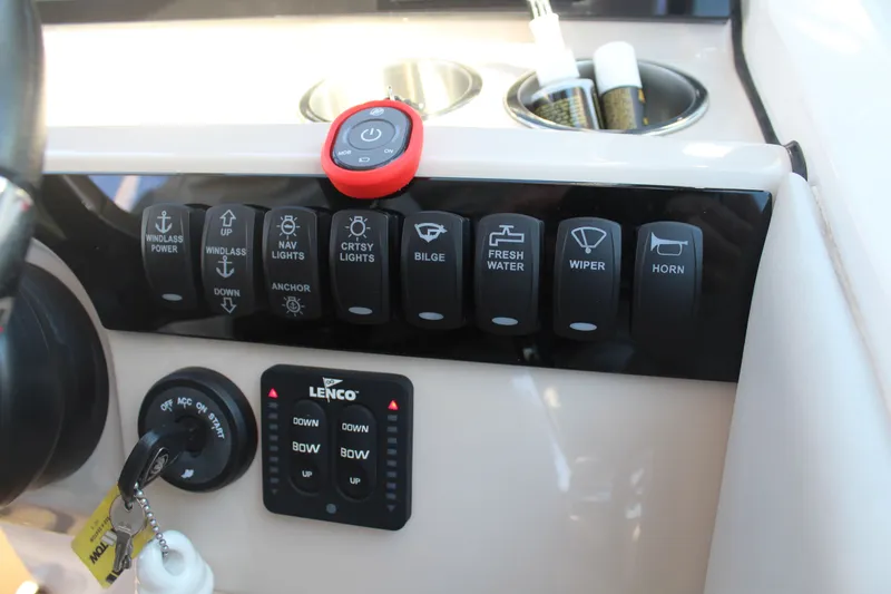 Going To The Sun Yacht Photos Pics Control panel of 2023 Boston Whaler 240 Vantage with switches and controls.