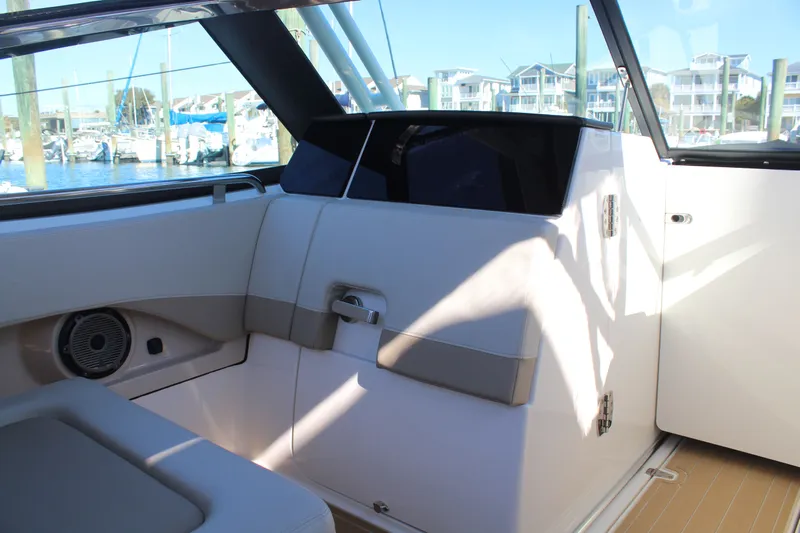 Going To The Sun Yacht Photos Pics Interior of 2023 Boston Whaler 240 Vantage with seating area.