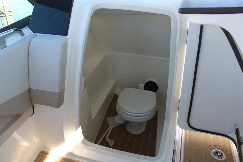 Going To The Sun Yacht Photos Pics Interior of 2023 Boston Whaler 240 Vantage with toilet.