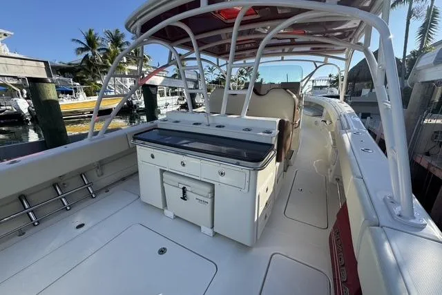  Yacht Photos Pics 2011 Hydra-Sports 4200 SF boat interior with seating and storage, docked at marina.