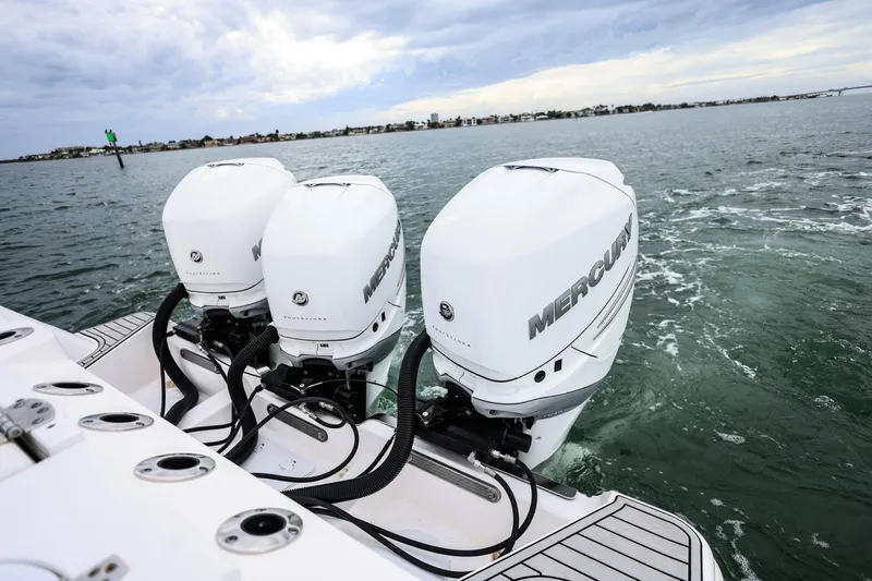  Yacht Photos Pics 2022 Sea Fox 368 Commander with triple Mercury outboard engines on open water.