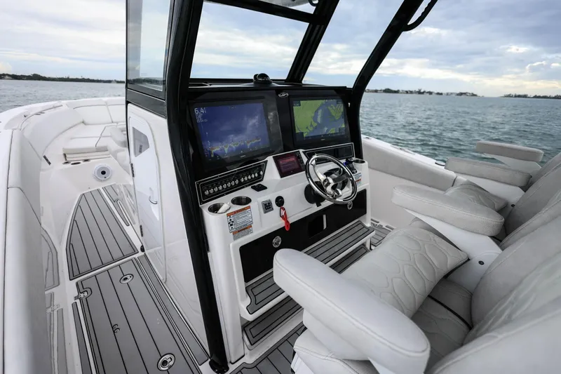  Yacht Photos Pics 2022 Sea Fox 368 Commander boat cockpit with advanced navigation displays and luxurious seating.