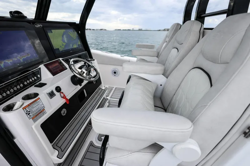  Yacht Photos Pics 2022 Sea Fox 368 Commander helm with advanced navigation displays and luxurious seating.