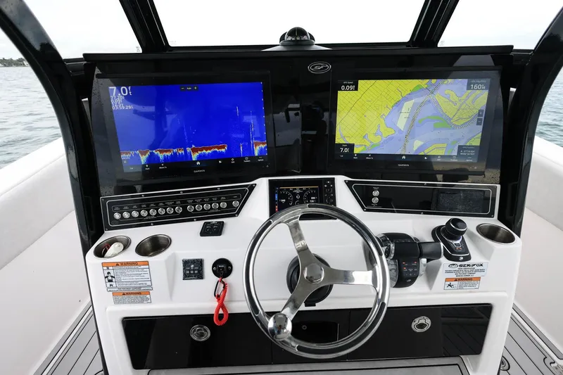  Yacht Photos Pics 2022 Sea Fox 368 Commander helm with dual Garmin displays and modern controls.