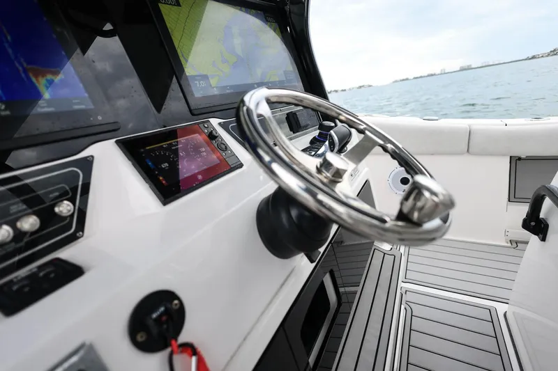  Yacht Photos Pics 2022 Sea Fox 368 Commander helm with advanced navigation displays and sleek steering wheel.