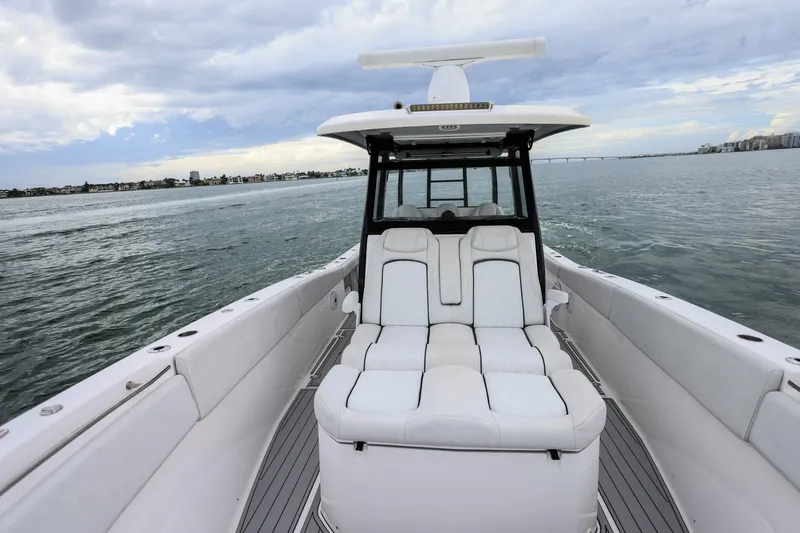  Yacht Photos Pics 2022 Sea Fox 368 Commander boat with luxurious seating on calm waters.