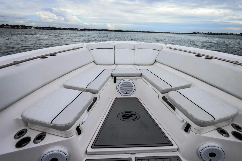  Yacht Photos Pics 2022 Sea Fox 368 Commander boat interior with cushioned seating and ocean view.