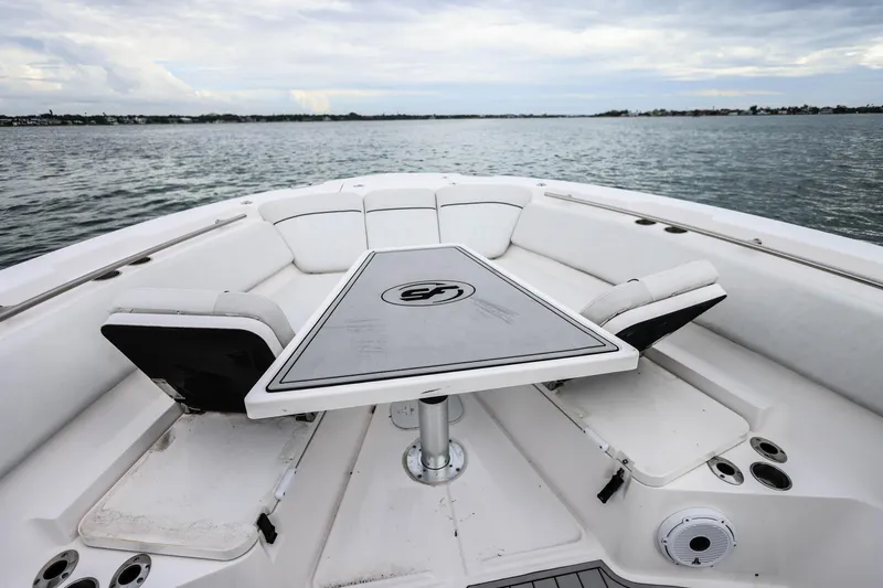  Yacht Photos Pics 2022 Sea Fox 368 Commander boat interior with seating and table on open water.