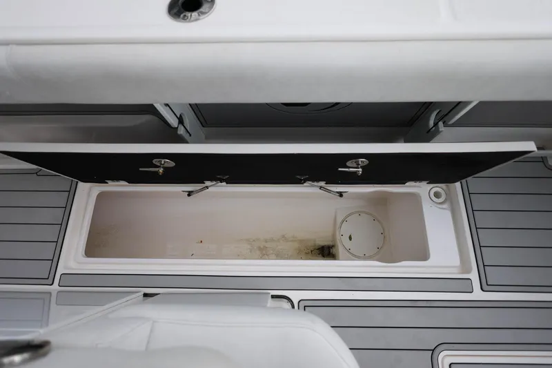  Yacht Photos Pics 2022 Sea Fox 368 Commander storage compartment with open lid, showcasing interior space.