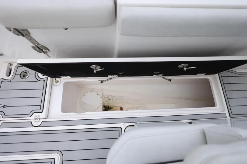  Yacht Photos Pics Open storage compartment on 2022 Sea Fox 368 Commander boat, featuring sleek design and ample space.