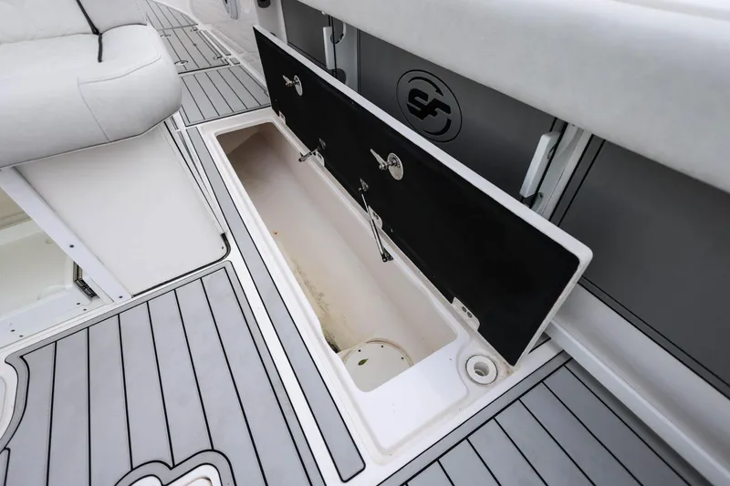  Yacht Photos Pics 2022 Sea Fox 368 Commander boat storage compartment with open hatch and sleek interior design.