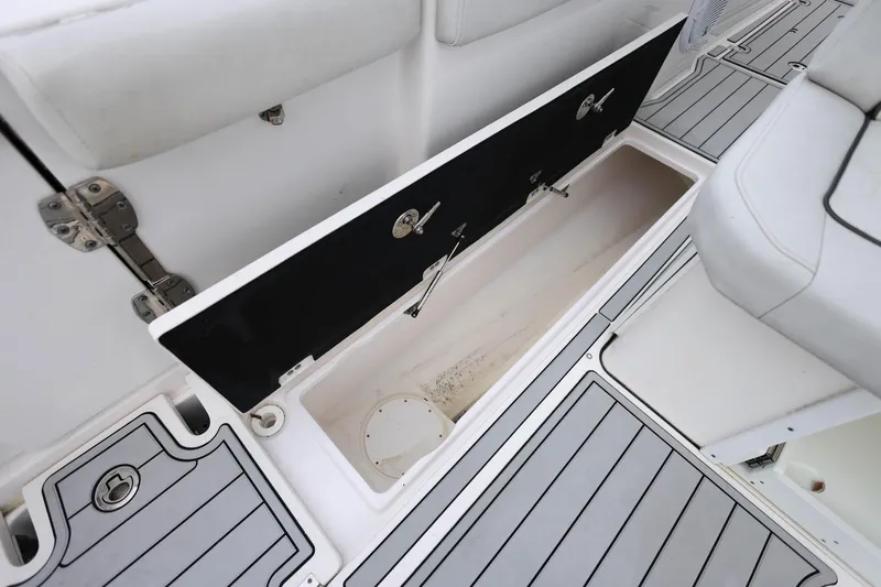  Yacht Photos Pics 2022 Sea Fox 368 Commander storage compartment with open hatch, showcasing sleek design.