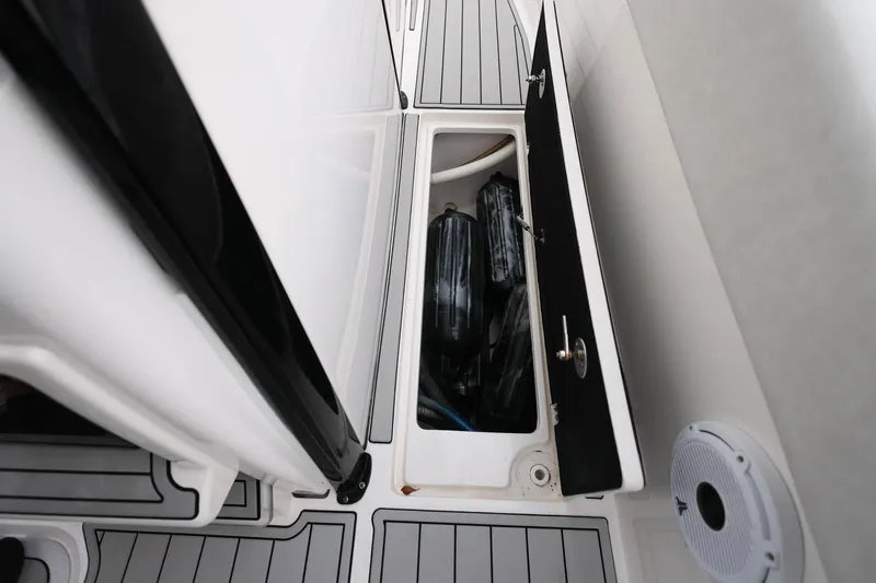  Yacht Photos Pics Storage compartment on 2022 Sea Fox 368 Commander boat, featuring sleek design and equipment.