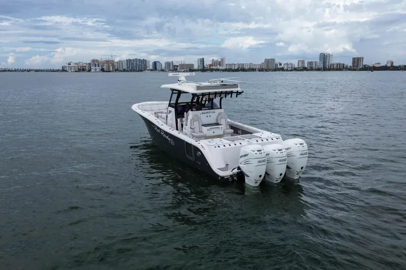  Yacht Photos Pics 2022 Sea Fox 368 Commander boat with triple Mercury 400 engines on open water.