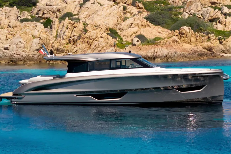  Yacht Photos Pics 2026 Solaris Power 52 Coupe yacht in serene coastal waters.