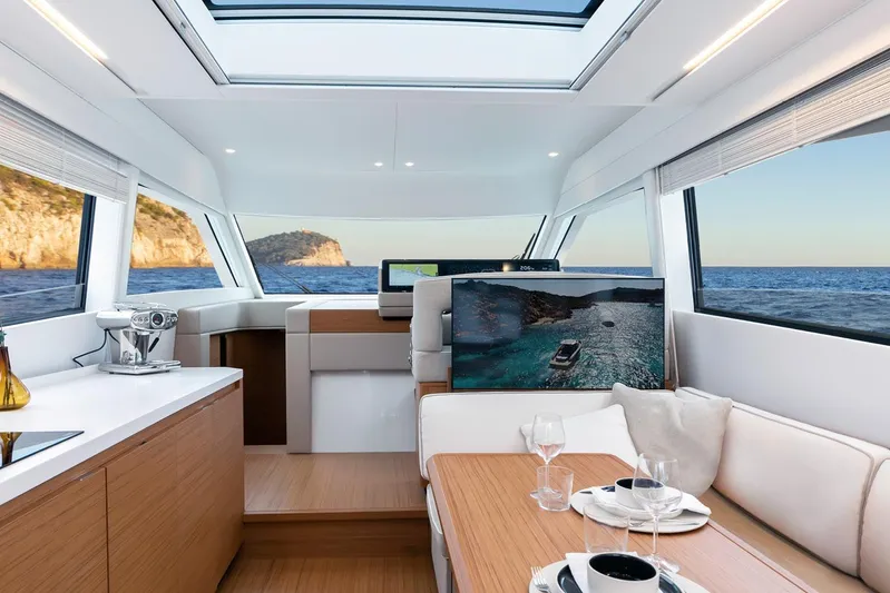  Yacht Photos Pics Luxurious interior of 2026 Solaris Power 52 Coupe yacht with ocean view.