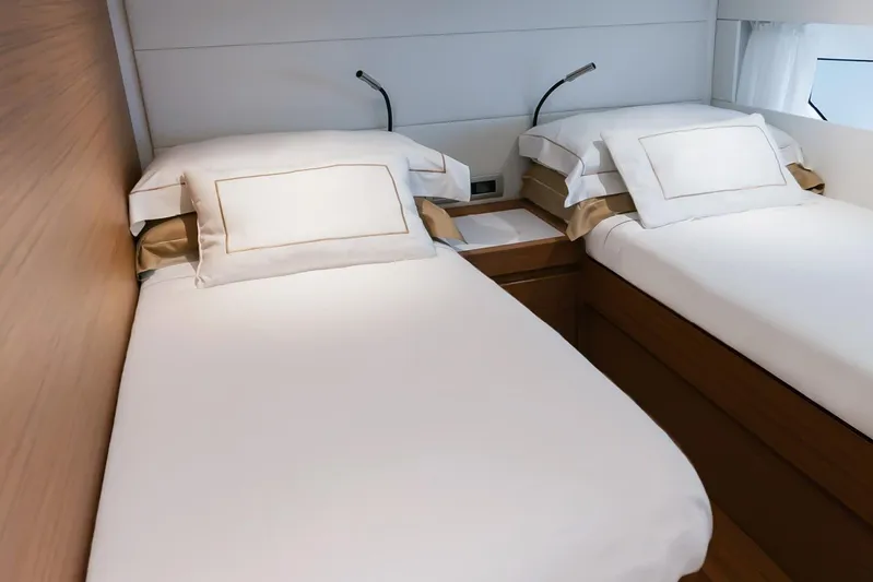  Yacht Photos Pics Interior of 2026 Solaris Power 52 Coupe featuring twin beds with modern design.