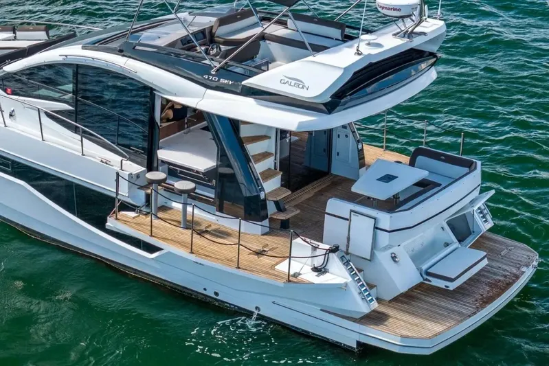 Good Vibes Yacht Photos Pics 2022 Galeon 470 Sky yacht with sleek design and spacious deck on open water.