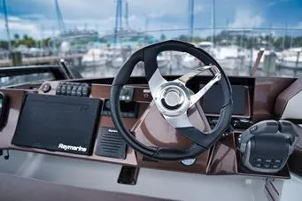 Good Vibes Yacht Photos Pics 2022 Galeon 470 Sky yacht helm with modern steering and navigation controls.