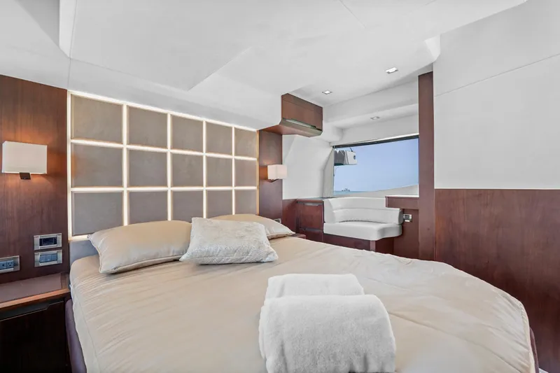 Good Vibes Yacht Photos Pics Luxurious bedroom interior of 2022 Galeon 470 Sky yacht with modern design and ocean view.
