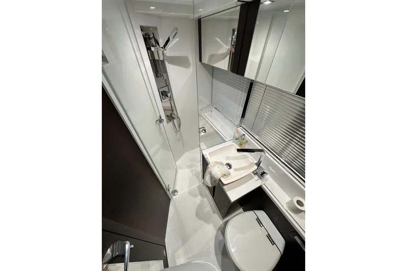 Good Vibes Yacht Photos Pics Modern bathroom in 2022 Galeon 470 Sky yacht, featuring sleek fixtures and elegant design.