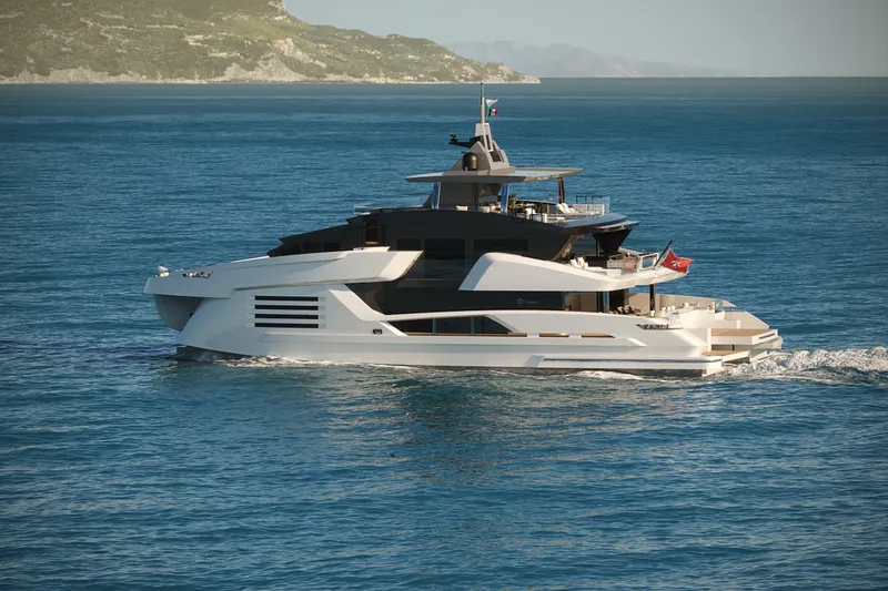 Cat 110 Yacht Photos Pics Luxurious Venture CAT 110 yacht cruising in clear blue waters, 2027 model.