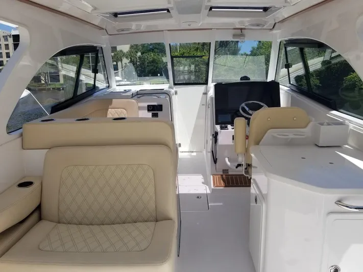 Nauti Nole Yacht Photos Pics Interior of 2021 Southport 33 DC with luxurious seating.