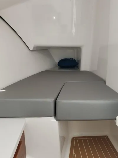 Nauti Nole Yacht Photos Pics Interior of 2021 Southport 33 DC with gray upholstery.