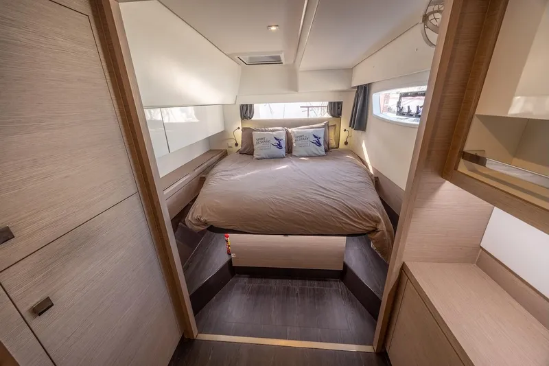 Spirit Of Ecstacy Yacht Photos Pics Luxurious bedroom interior of 2023 Fountaine Pajot Tanna 47 yacht.