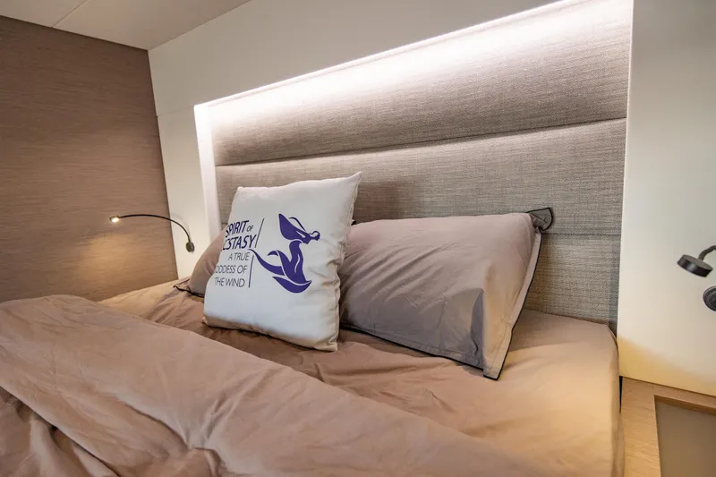 Spirit Of Ecstacy Yacht Photos Pics Luxurious bedroom interior of 2023 Fountaine Pajot Tanna 47 yacht.