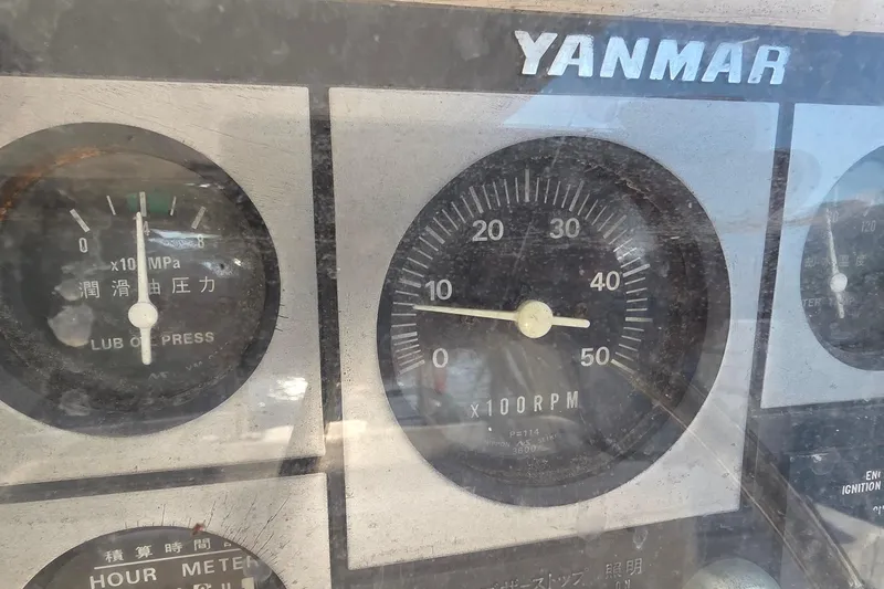 Beshert Yacht Photos Pics Close-up of Yanmar engine gauges on a 2004 Leopard 47 yacht.