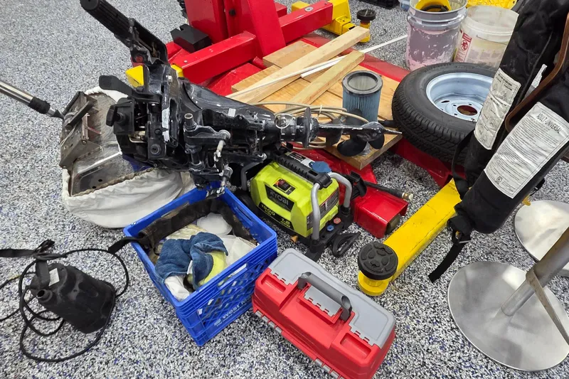 Beshert Yacht Photos Pics Workshop tools and equipment for Leopard 47, 2004 model, including tire and air compressor.