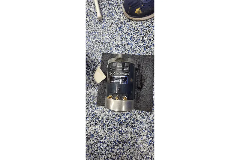 Beshert Yacht Photos Pics Electric motor on speckled floor, Leopard 47, 2004 model.