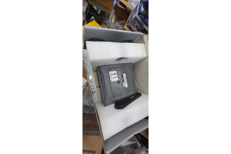 Beshert Yacht Photos Pics Boxed marine equipment for Leopard 47, 2004 model, with protective foam packaging.