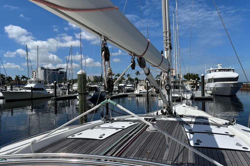 Seas The Day Yacht Photos Pics 2014 Bavaria Vision 46 sailboat docked in a marina under a clear blue sky.