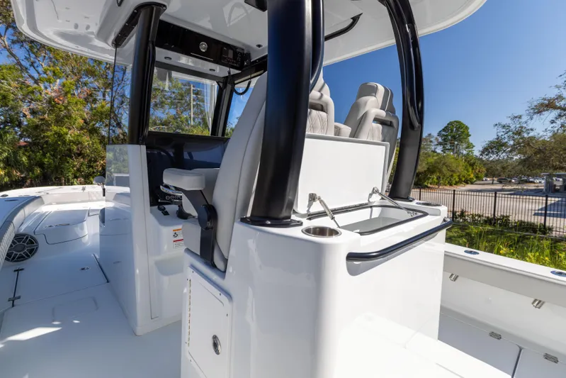  Yacht Photos Pics 2024 Freeman 28 boat interior with sleek seating and modern console design.