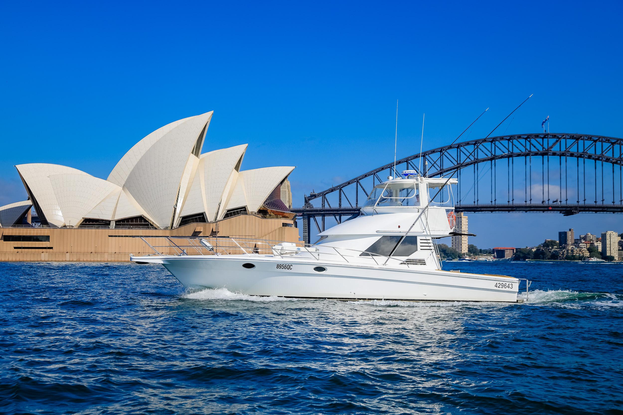 1993 Precision 47 Flybridge yacht near Sydney Opera House and Harbour Bridge.